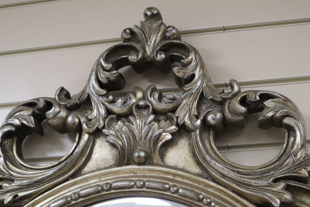 A Victorian style oval wall mirror, 90 x 136cm